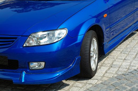 A close up shot (front view) of sportive car