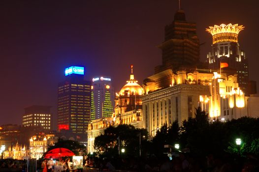 The night view of Shanghai Bund, where the commerical buildings are of vintage structure.