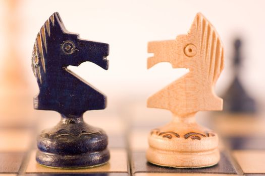 Conceptual with wood chess pieces