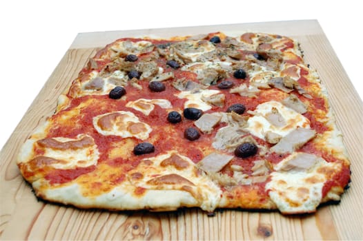 pizza garnished wiht tunny and olive  served on a wooden tray