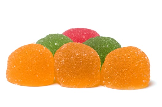 Multi-colored fruit candy on a white background.