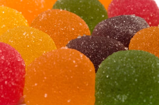 Background from multi-colored fruit candy a close up.