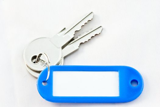 Bunch of keys with blank label isolated on white. Easy to add your own label