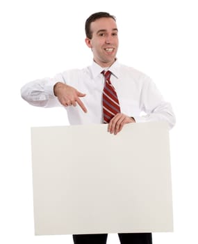 A young man holding up your advertisement and pointing at it, isolated against a white background