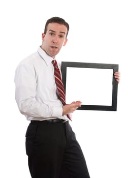 A young man holding and showing a frame with white copyspace inside