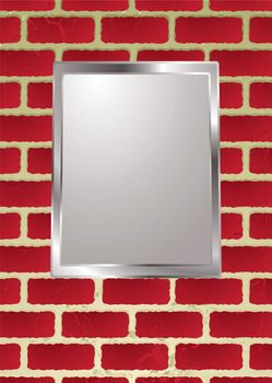 silver picture frame hanging on a brick wall with shadow