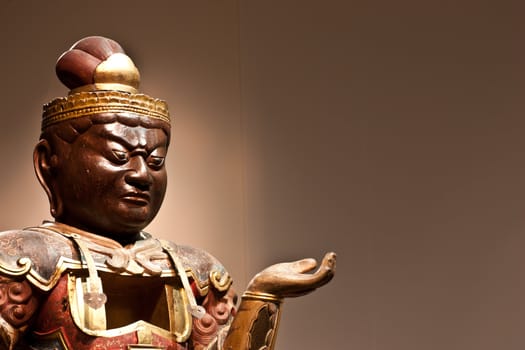 Statue of a guardian, south east of Asia, with copy space