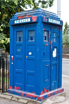 Blue Police box in Glasgow, industrial area