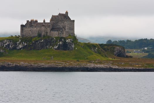 Scottish castle close to Oban, south Scotland, in a cloudy day