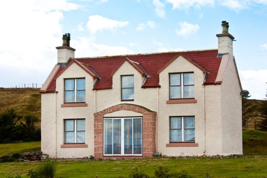 Scotland. Beutiful house in red and white colours.