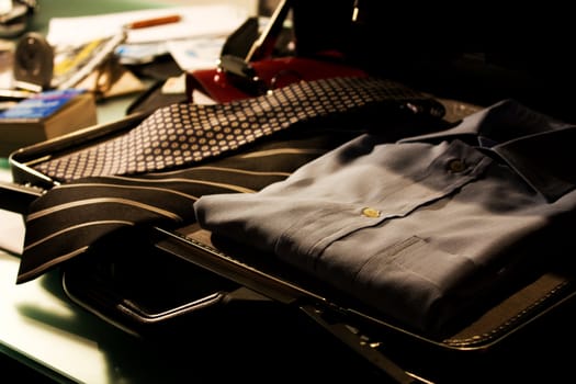 A suitcase of a businessman ready for the departure