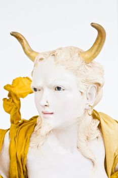 Demon face on white, close detail, focus on eyes