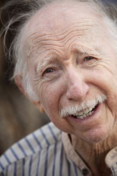 Portrait of a Handsome Senior Man Outdoors