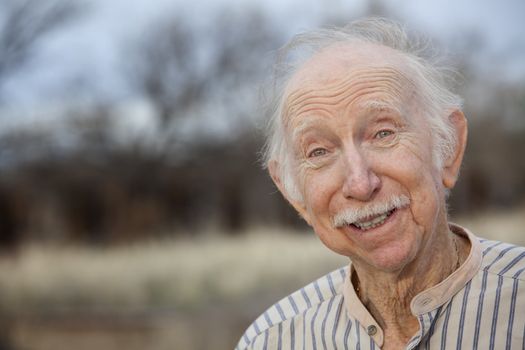 Portrait of a Handsome Senior Man Outdoors 