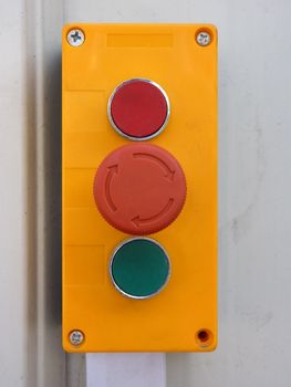 Detail of a switch connected with a factory door used by forklift