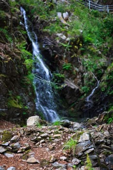 picture of a wounderful waterfall in the green forest