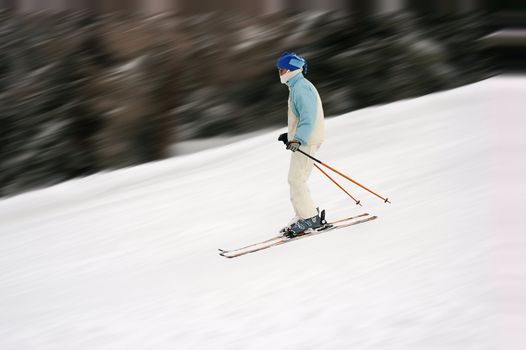 Female skier with motion blur