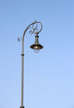 Traditional city light under clear blue sky
