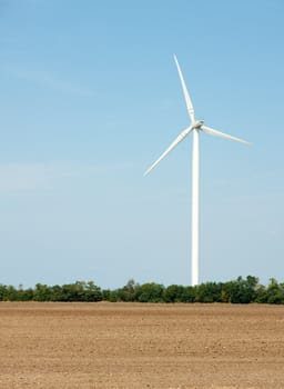 Wind power station on an open field