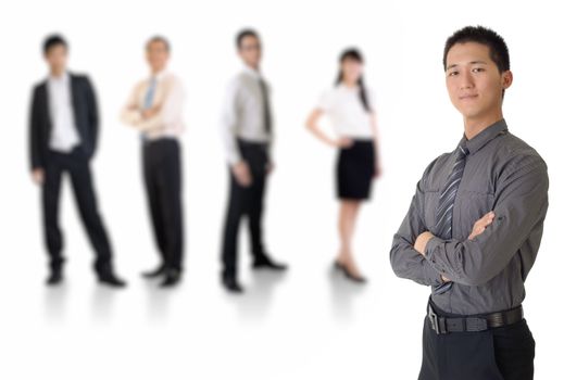 Young business man with his team over white background.