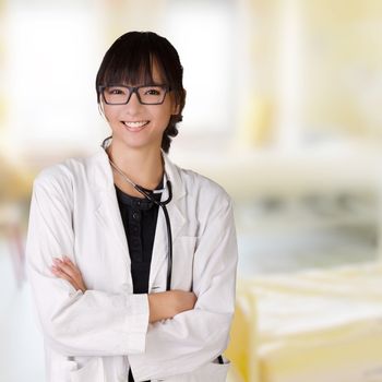 Young Asian doctor of medical smiling in room of hospital.