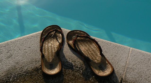 summer shoes and water blue