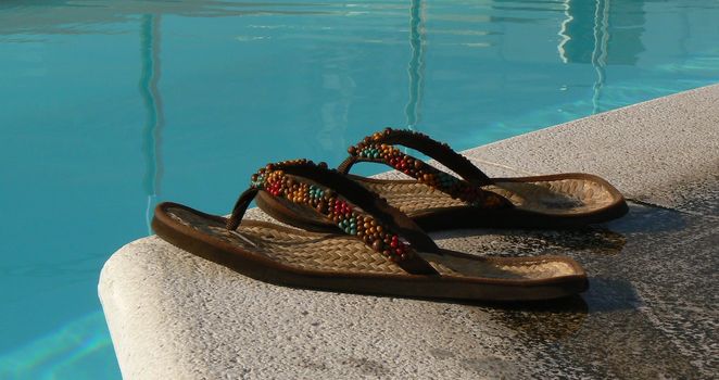 summer shoes and water blue