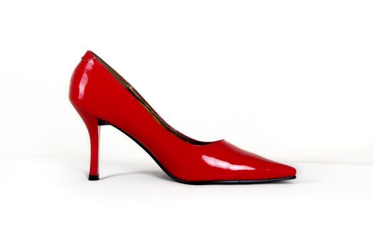 Picture of a single sexy red shoe 