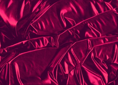An exclusive background of dark shiny pink decoration fabric with a metallic surface.
