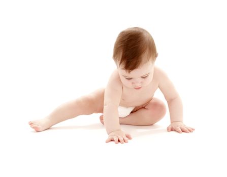 picture of sitting baby boy in diaper over white