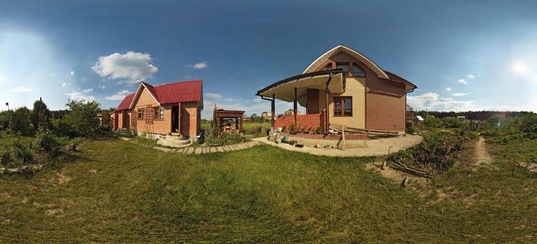 This is panoramic 360x180 view of cottage lawn and garden