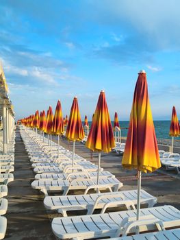 A lot of yellow summer umbrellas. It`s look like infinity