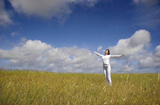 Beautiful woman having fun in the nature