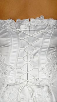 Corset of a white wedding dress - the rear view