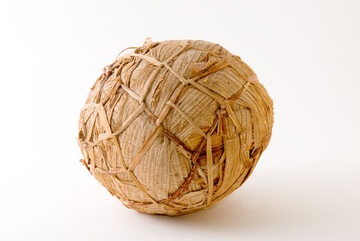 African soccer ball made of banana leaves for kids' games.