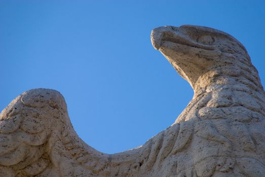 Close up of an old statue of an eagle in Rome, Italy.