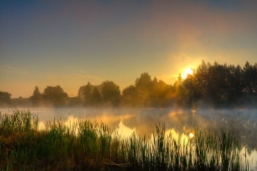 dramatic sunrise on lake