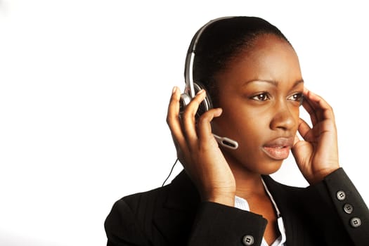 Closeup of a cute young business woman with headset