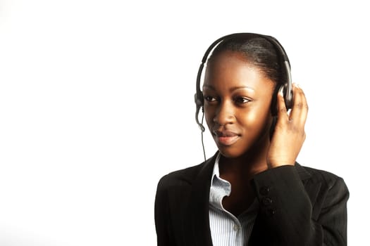 Pretty business woman with headset. Isolated over white background  