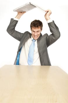 emotional man in office with computer on white background