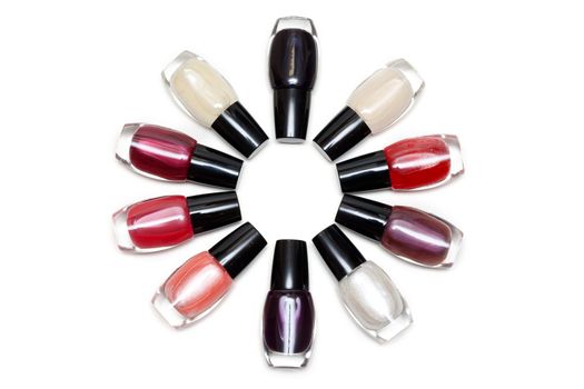Vials colour varnish nailwaer, make-up insulated on white background