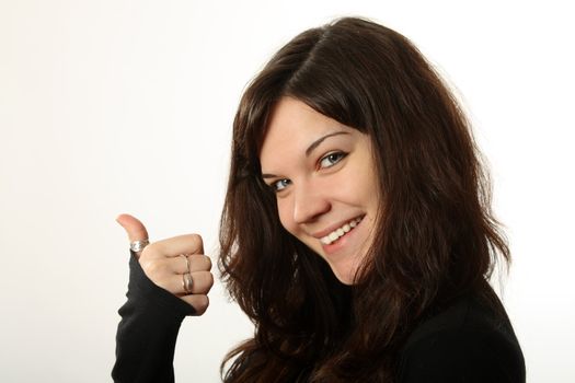 The beautiful, emotional girl on a white background