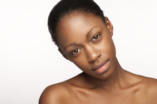 African woman with natural make-up headshoot 