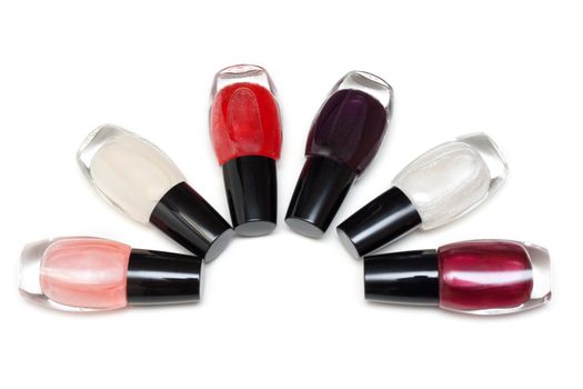 Vials colour varnish nailwaer, make-up insulated on white background