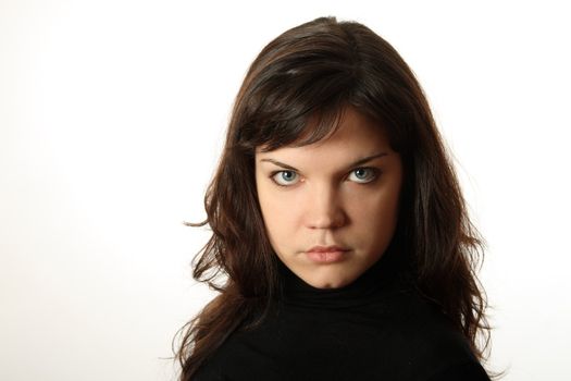 The beautiful, emotional girl on a white background