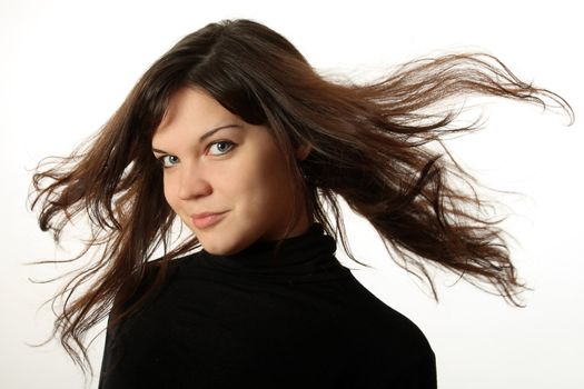 The beautiful, emotional girl on a white background