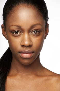 African woman with natural make-up headshoot 