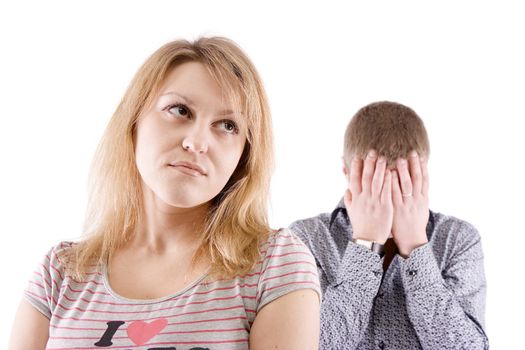 The young woman in the foreground and the upset man for background