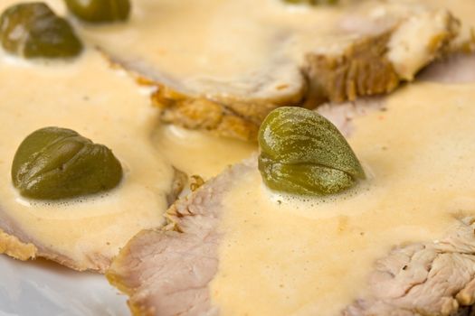 detail of vitello tonnato on a plate