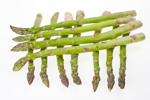 green asparagus isolated on white background